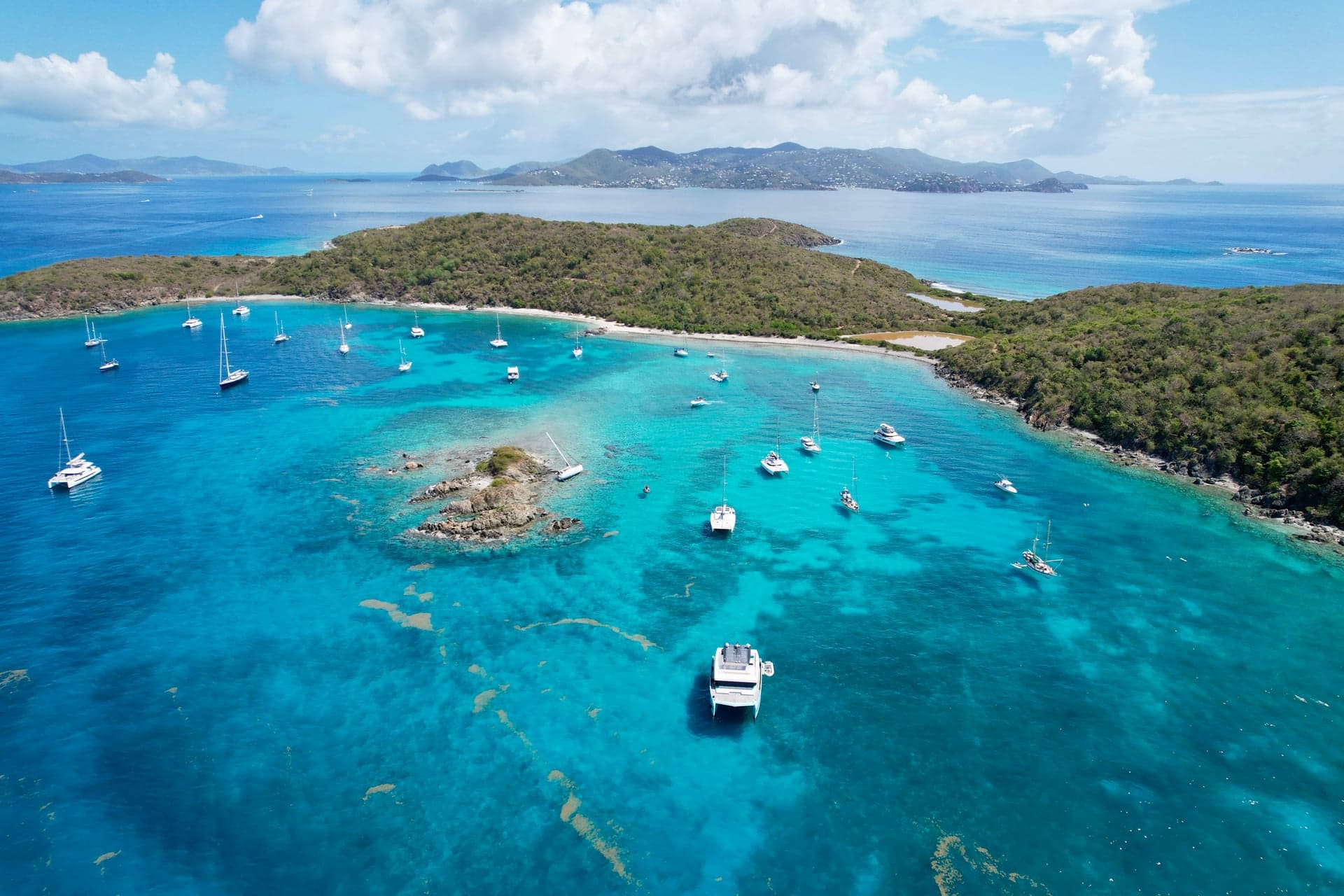 Orca at anchor over a coral reef
